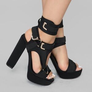 Black platform heels never worn